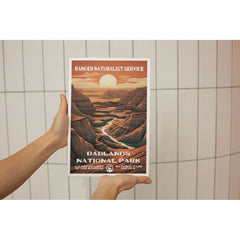 Badlands National Park Poster – Layered Badlands & Setting Sun – Ranger Header